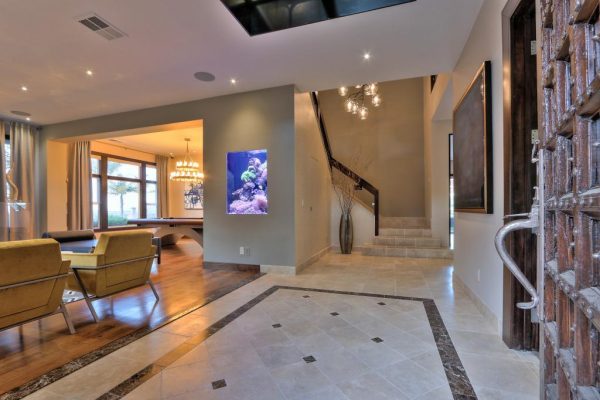 Tiled entry with fish tank. (Photo courtesy of Intero Real Estate Services)
