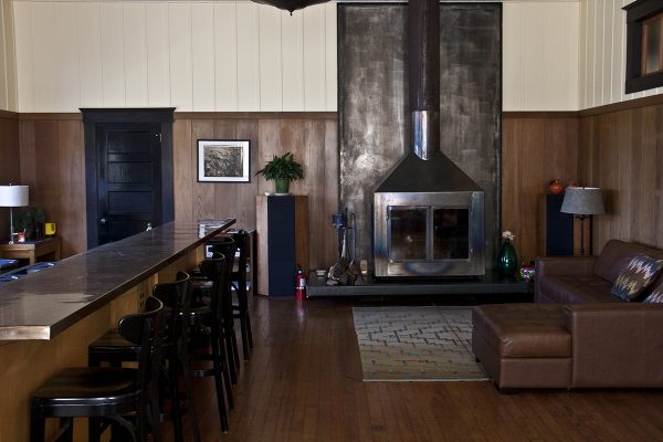 Kitchen and view of the fireplace.